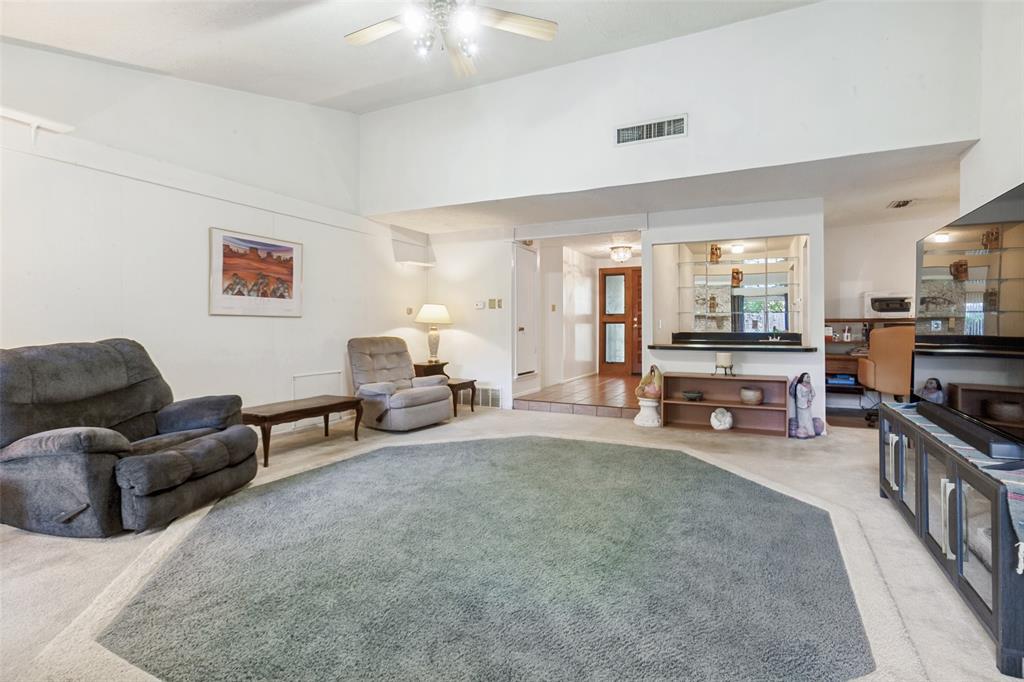 44 Merrie Circle Richardson, TX 75081 - Photo 7 of 30 a living room with furniture and a flat screen tv