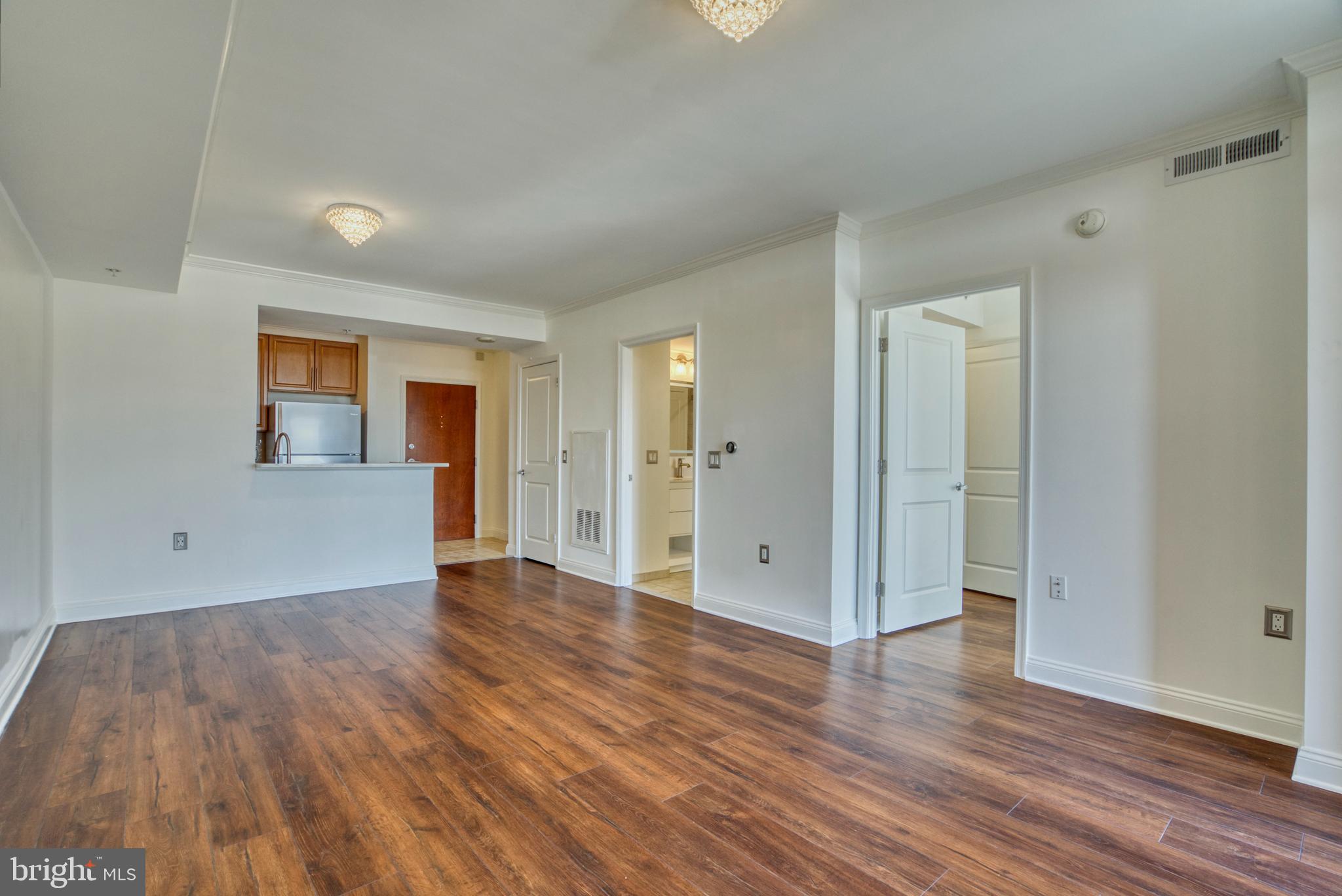 11760 Sunrise Valley Drive, Unit 809 Reston, VA 20191 - Photo 26 of 58 Living into Dining Area