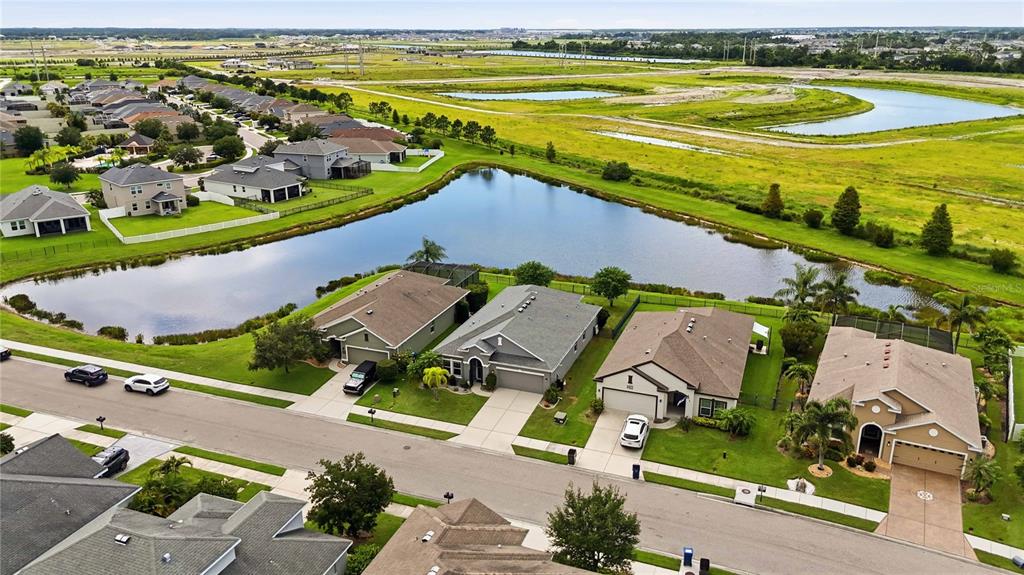 10920 79th Street East Parrish, FL 34219 - Photo 58 of 73 an aerial view of a city with lawn chairs