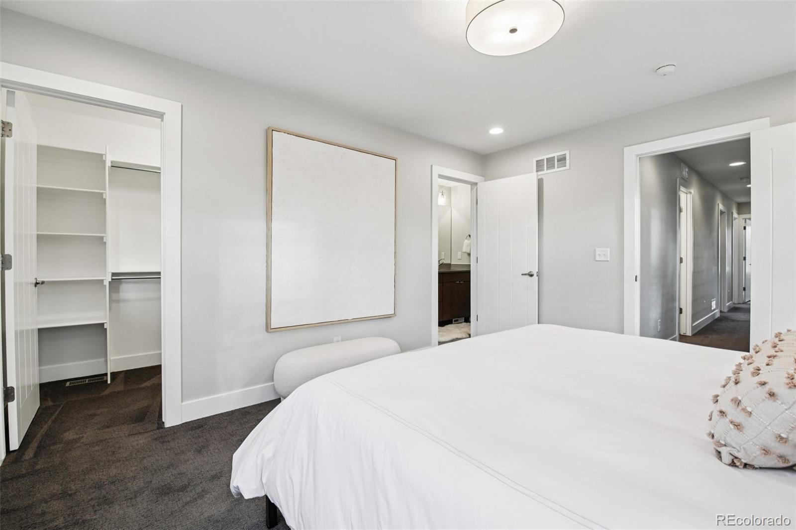 2825 Stout Street Denver, CO 80205 - Photo 16 of 42 a bathroom with a bathtub and a sink