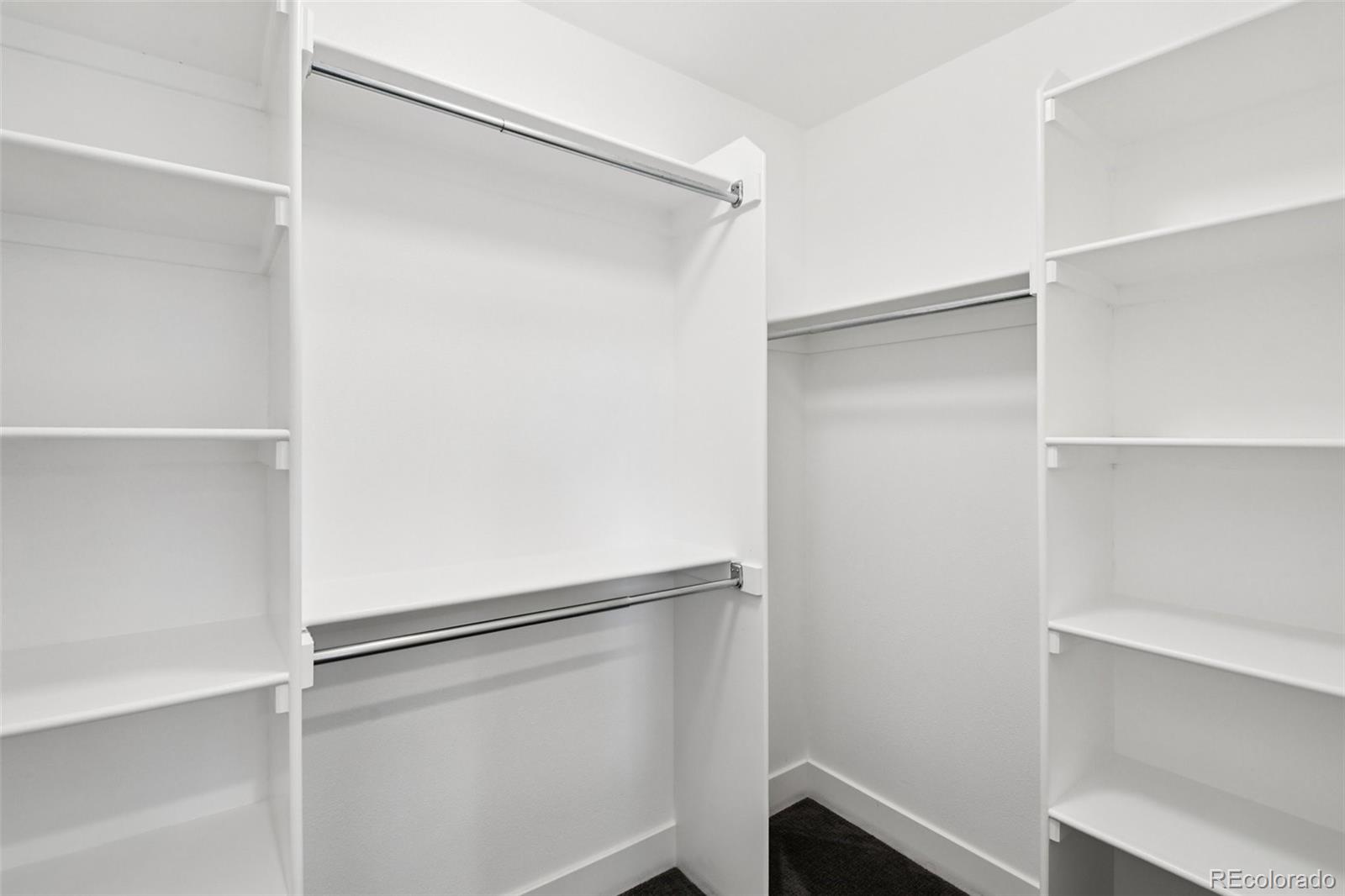 2825 Stout Street Denver, CO 80205 - Photo 17 of 42 a view of an empty walk in closet