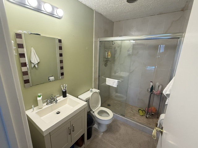 2005 South Finley Road, Unit 203 Lombard, IL 60148 - Photo 14 of 15 a bathroom with a toilet a sink and shower