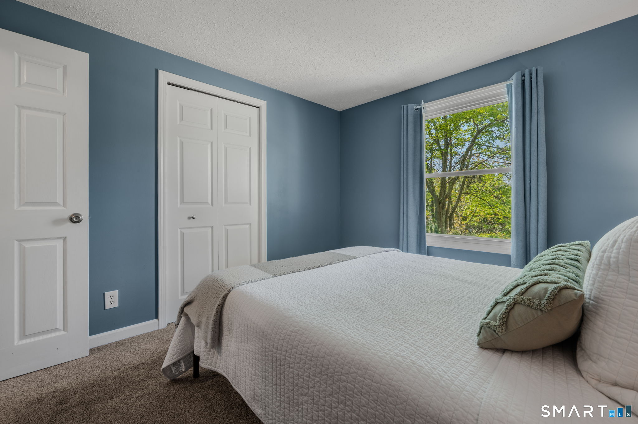 6 Amherst Court Groton, CT 06355 - Photo 18 of 40 a bedroom with a bed and a window