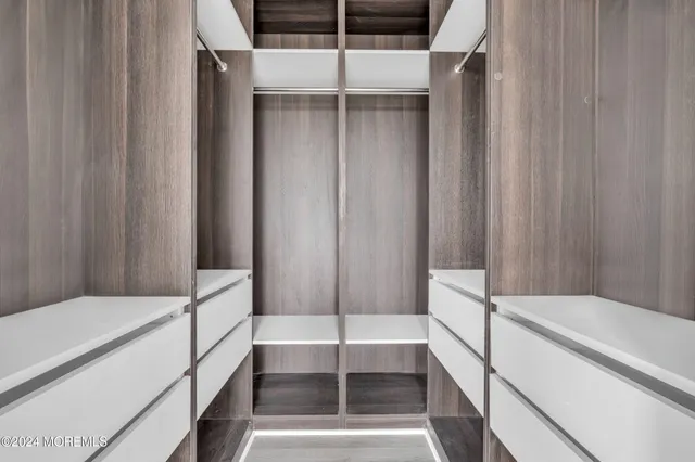 a bathroom with a bathtub and shower