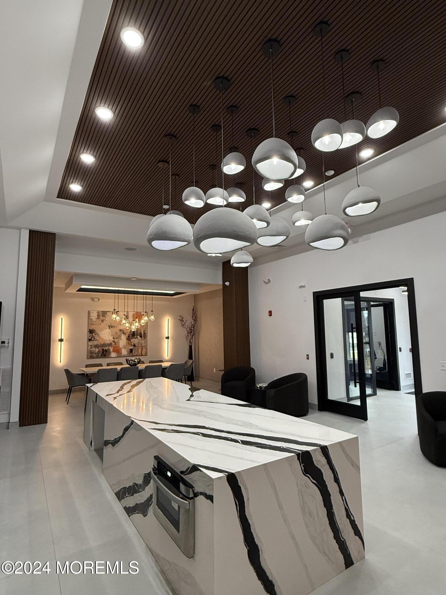 603 Texas Road Old Bridge, NJ 08857 - Photo 15 of 17 a room with stainless steel appliances kitchen island a large island in the center