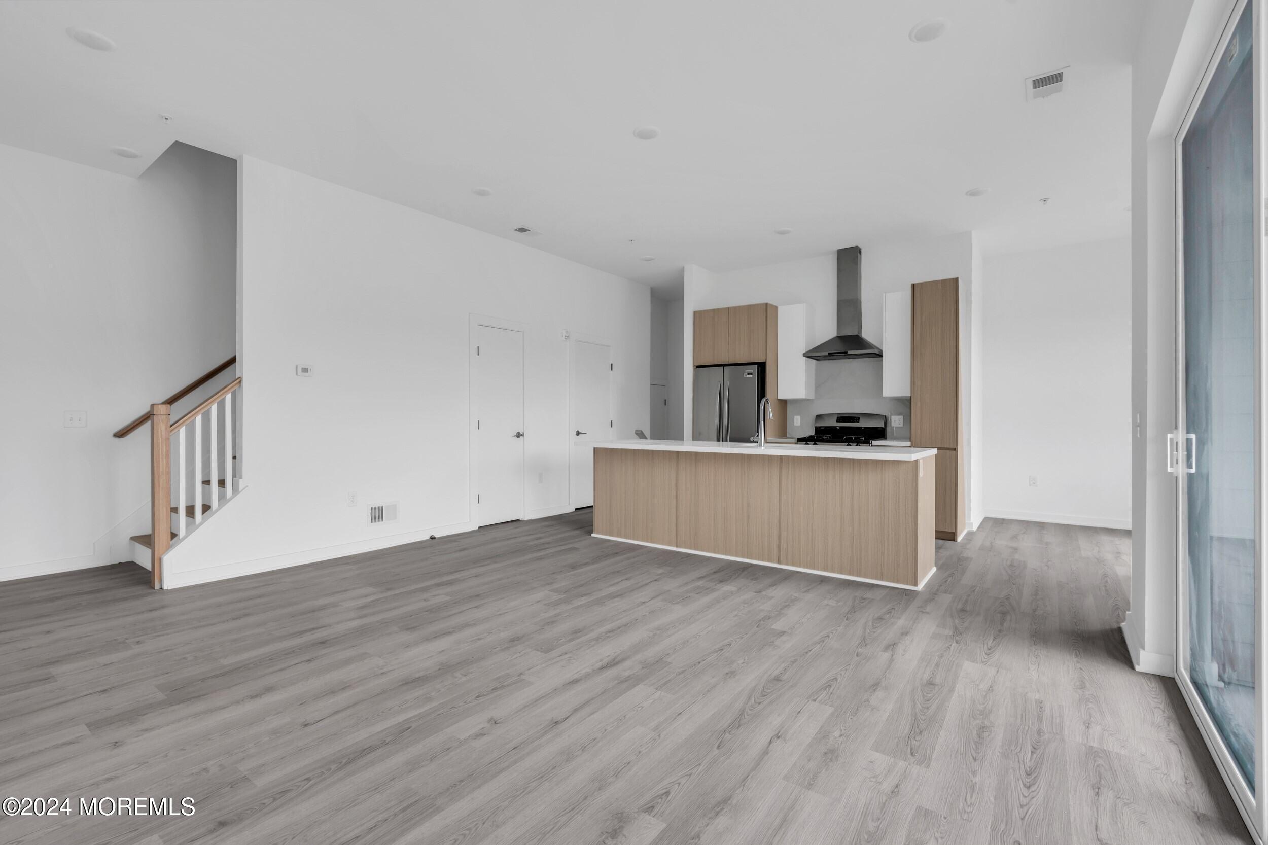 603 Texas Road Old Bridge, NJ 08857 - Photo 5 of 17 a view of kitchen with wooden floor