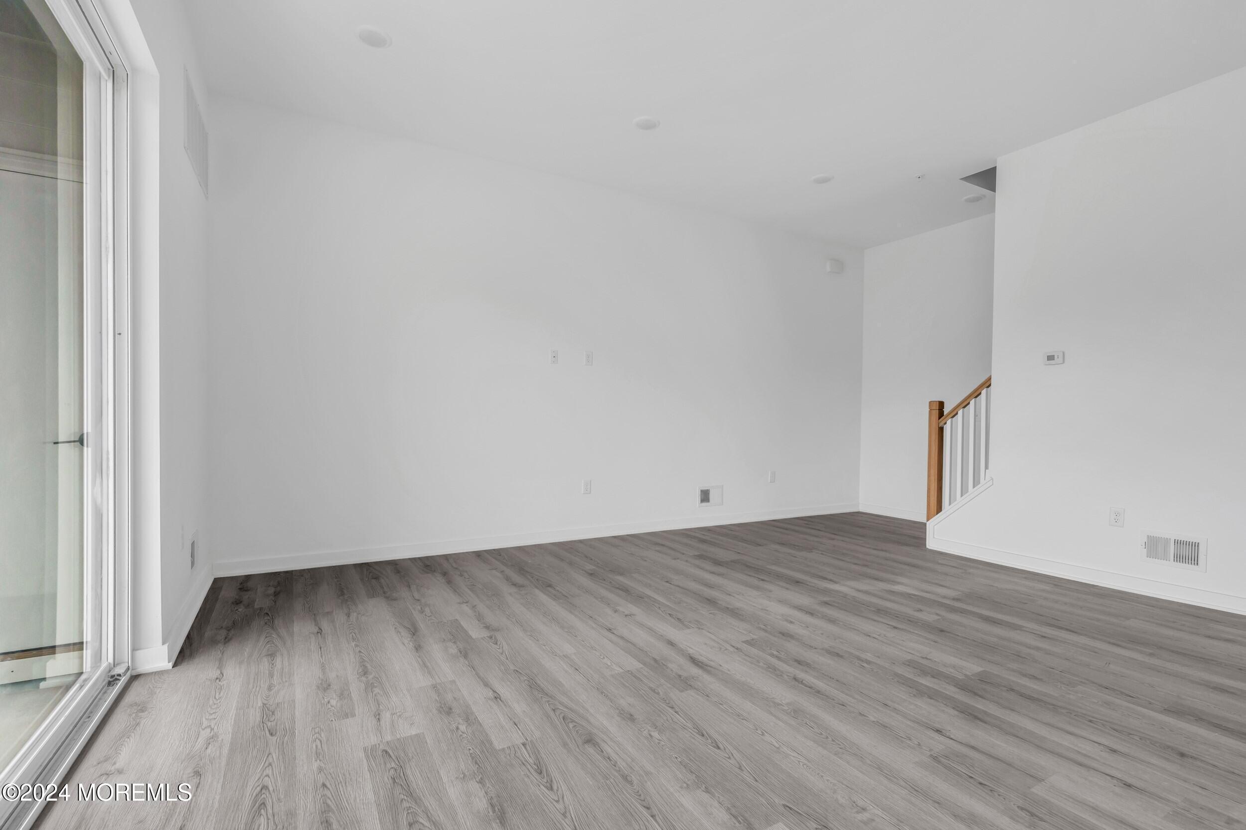603 Texas Road Old Bridge, NJ 08857 - Photo 10 of 17 a view of room with wooden floor and window