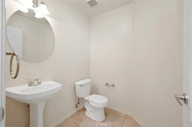 a view of storage and utility room with washer and dryer
