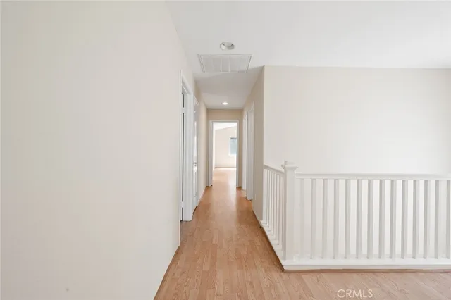 a bathroom with a granite countertop sink mirror and a bathtub