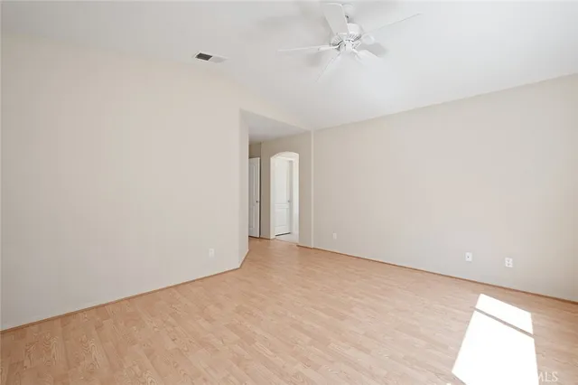a bathroom with a bathtub and window