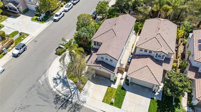 a view of a town with mountains in the background