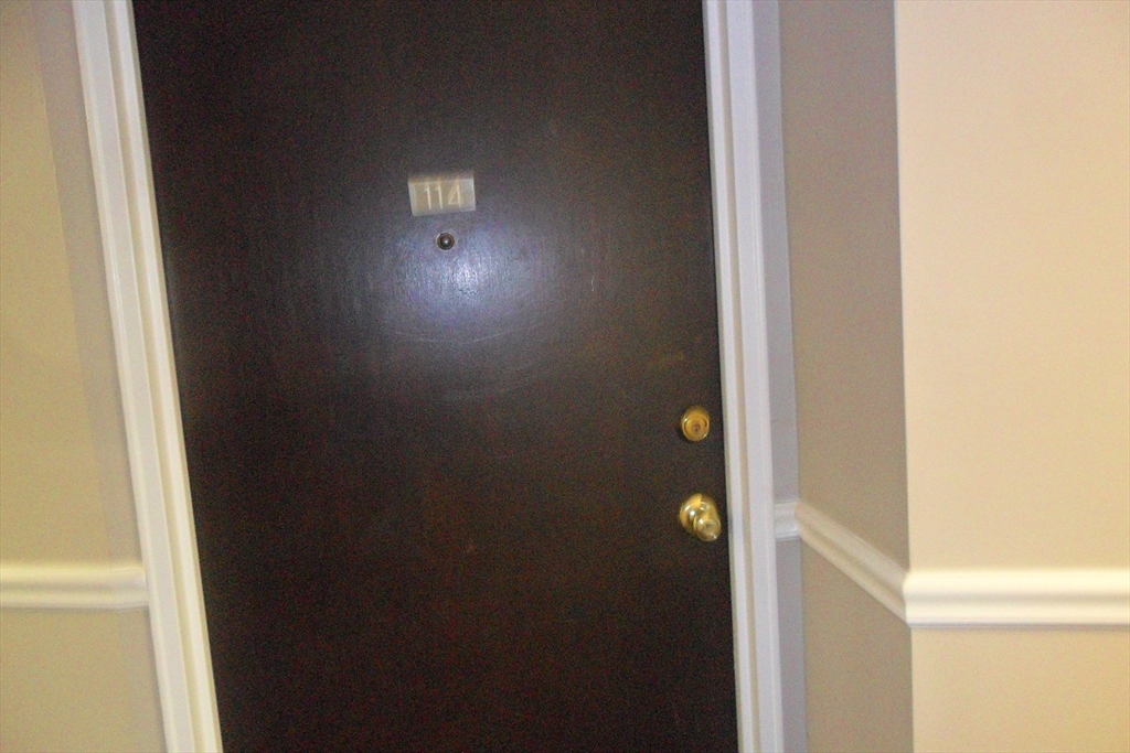 147 Turner Road, Unit 114 Holliston, MA 01746 - Photo 5 of 15 a view of an entryway