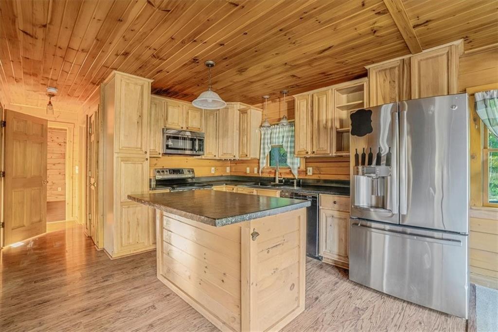210 October Drive Butler, PA 16002 - Photo 12 of 36 a kitchen with stainless steel appliances a refrigerator stove and sink