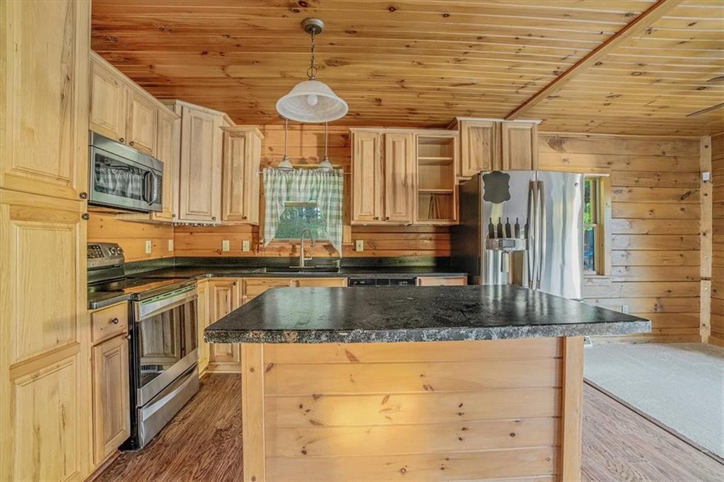 210 October Drive Butler, PA 16002 - Photo 13 of 36 a kitchen with stainless steel appliances granite countertop a sink and a stove