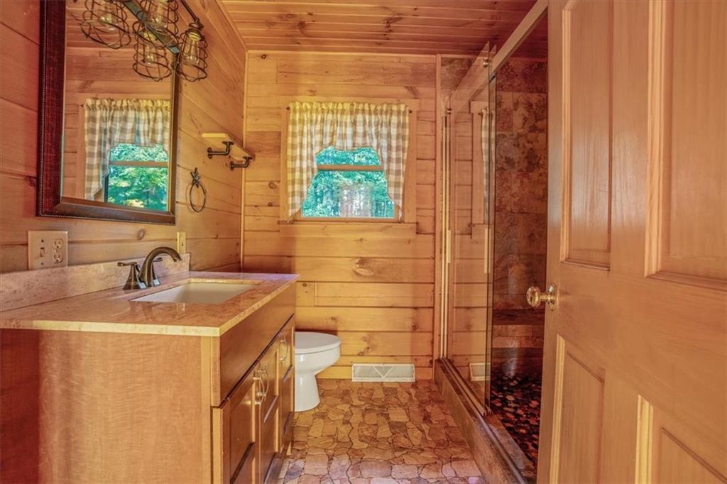 210 October Drive Butler, PA 16002 - Photo 22 of 36 a bathroom with a sink and a shower