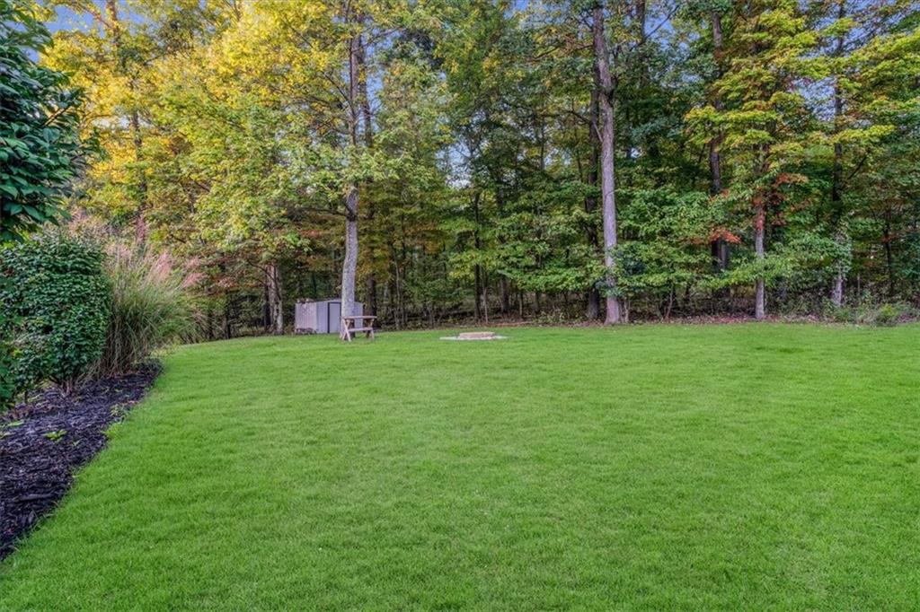 210 October Drive Butler, PA 16002 - Photo 30 of 36 a view of green field with trees in the background