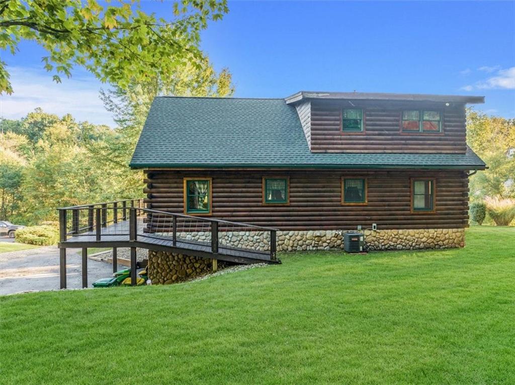 210 October Drive Butler, PA 16002 - Photo 3 of 36 a front view of a house with a garden