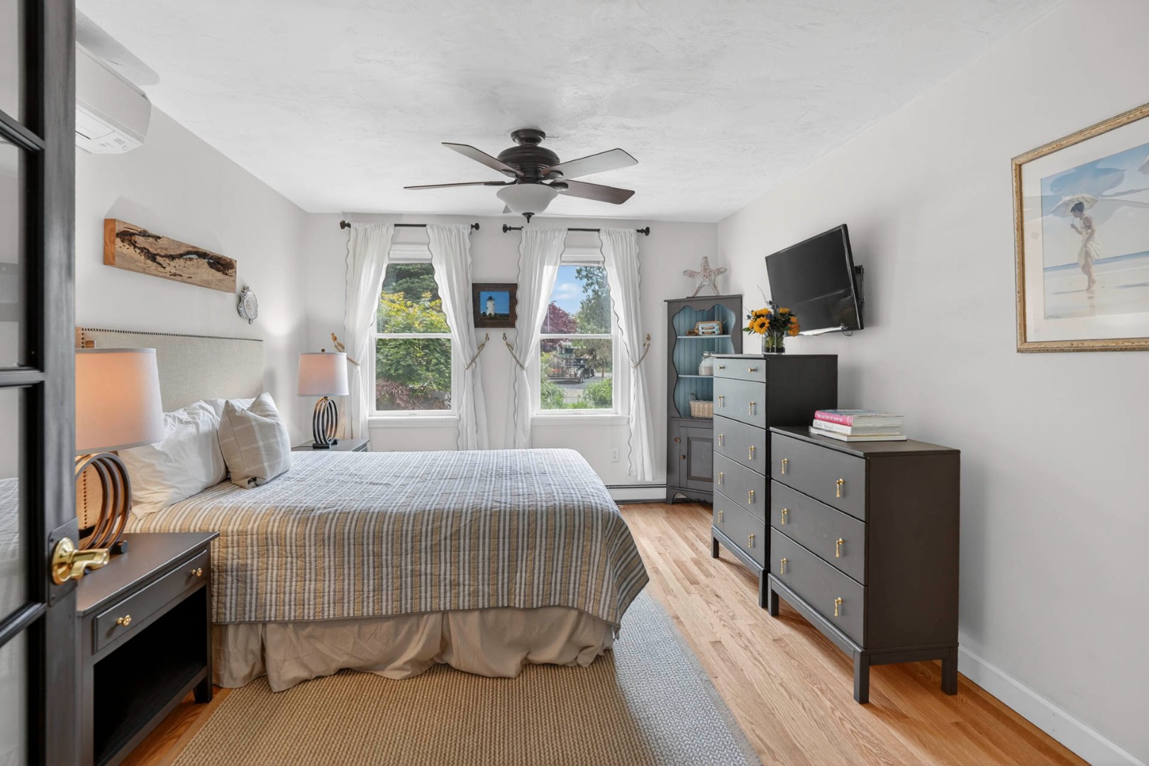 9 Thaxter Lane Edgartown, MA 02539 - Photo 37 of 53 a bedroom with a bed and a flat screen tv