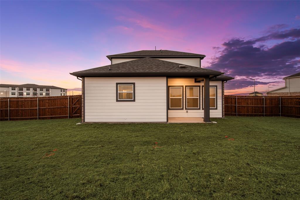 276 Sutter Mill Road Saginaw, TX 76131 - Photo 22 of 24 a house view with a garden space