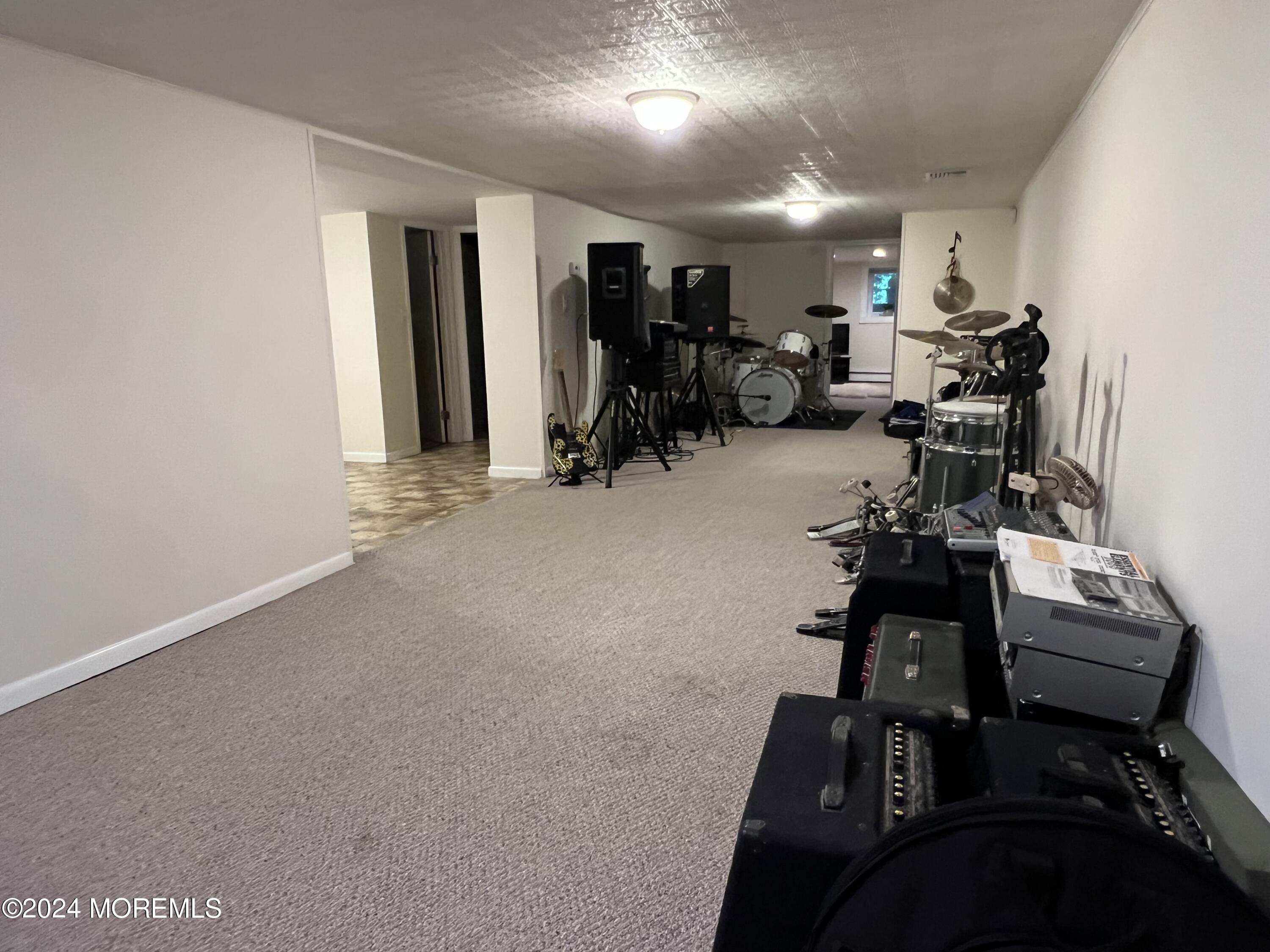 51 Lloyd Road Morganville, NJ 07751 - Photo 31 of 54 a view of a room with gym equipment