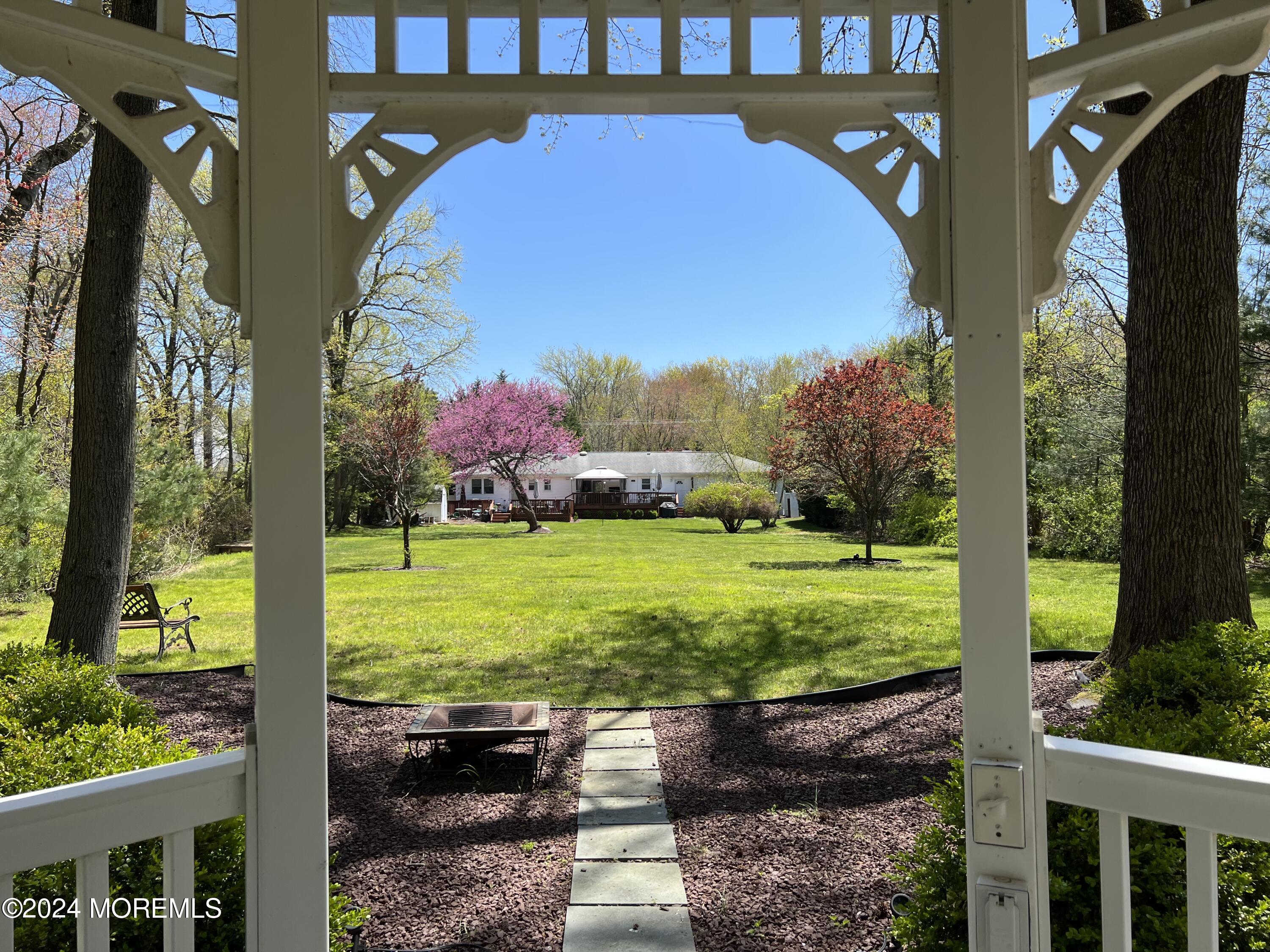 51 Lloyd Road Morganville, NJ 07751 - Photo 40 of 54 51L back house fr inside gazebo - L