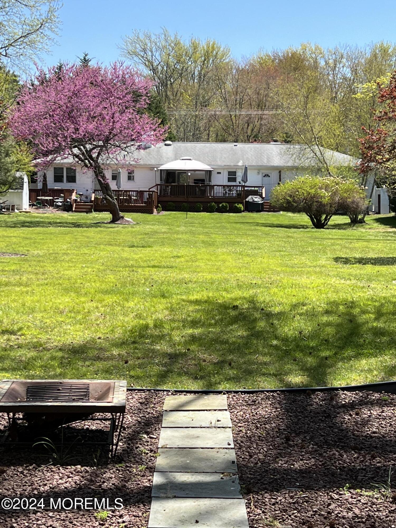 51 Lloyd Road Morganville, NJ 07751 - Photo 41 of 54 a view of a lake with houses