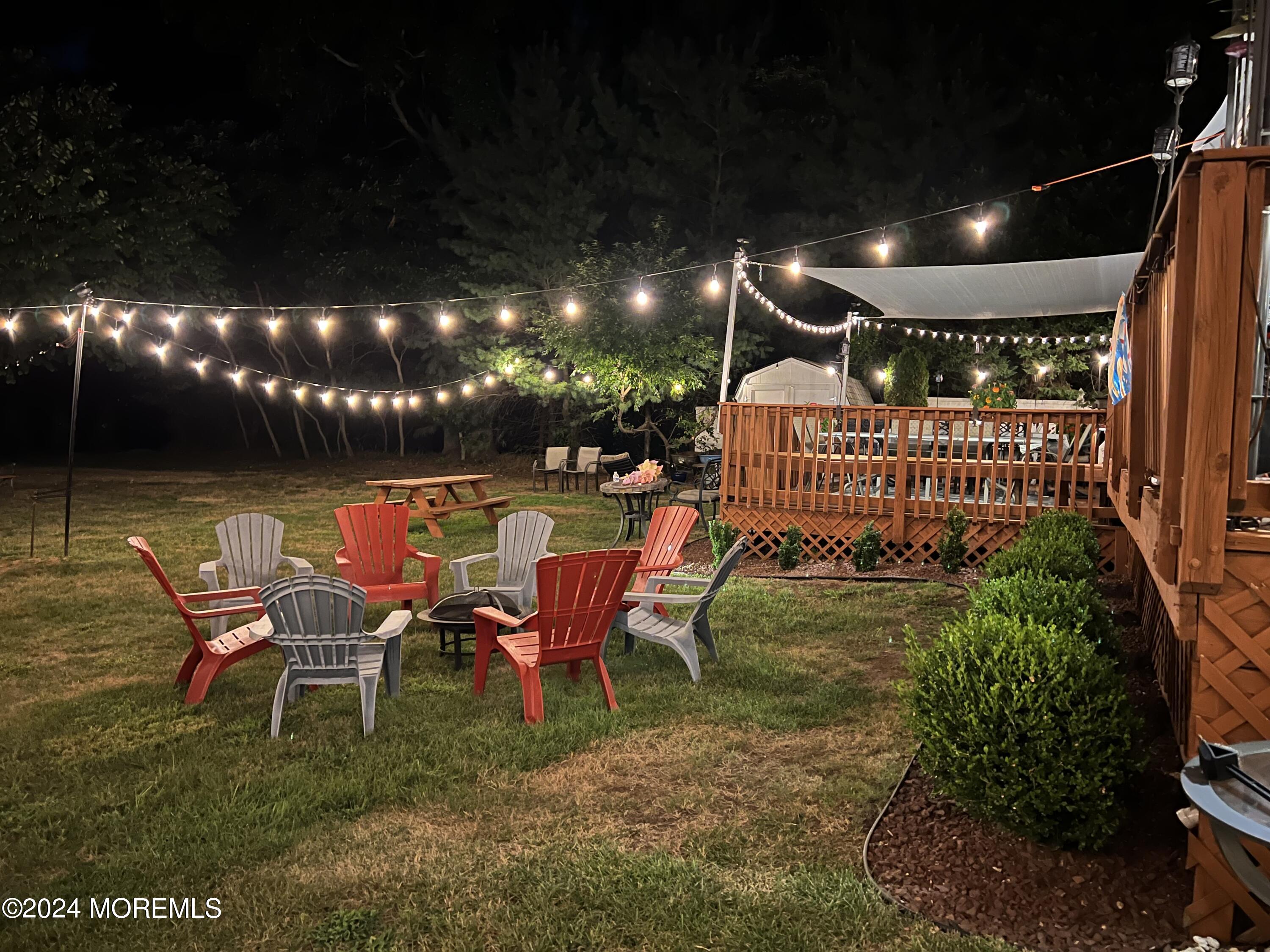 51 Lloyd Road Morganville, NJ 07751 - Photo 46 of 54 a view of a porch with furniture and garden