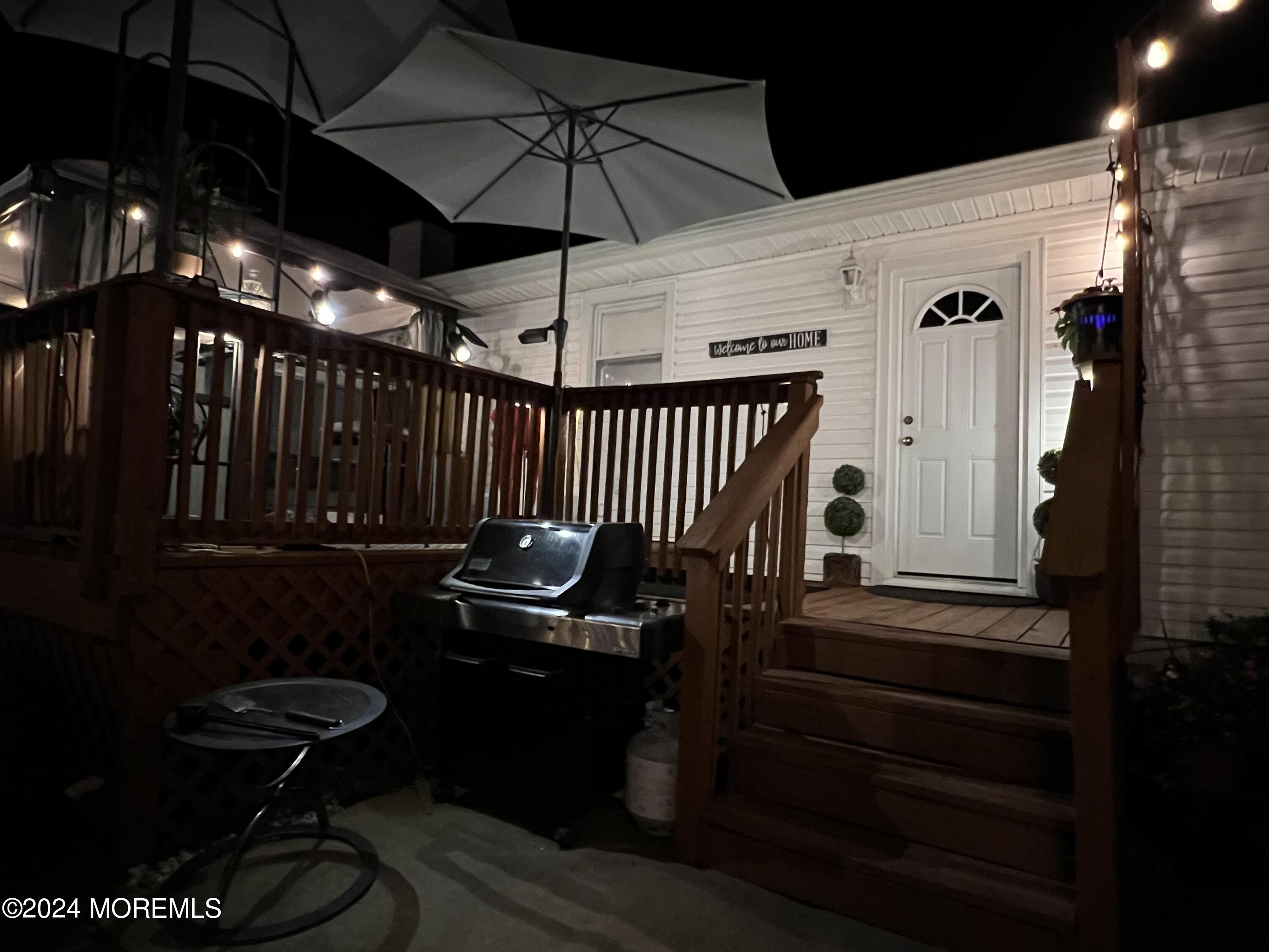 51 Lloyd Road Morganville, NJ 07751 - Photo 47 of 54 51L - nite to deck steps - L