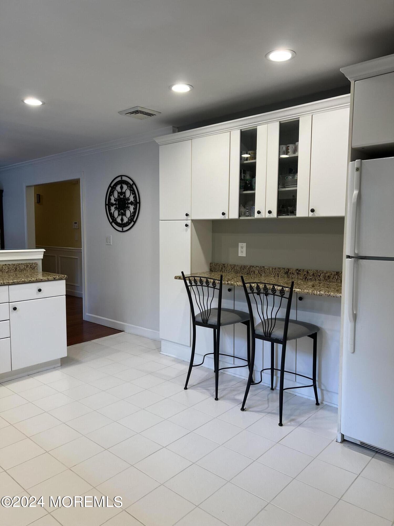 51 Lloyd Road Morganville, NJ 07751 - Photo 10 of 54 a view of kitchen with a sink a counter top space and appliances