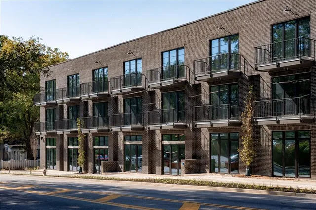 a front view of a building with street view