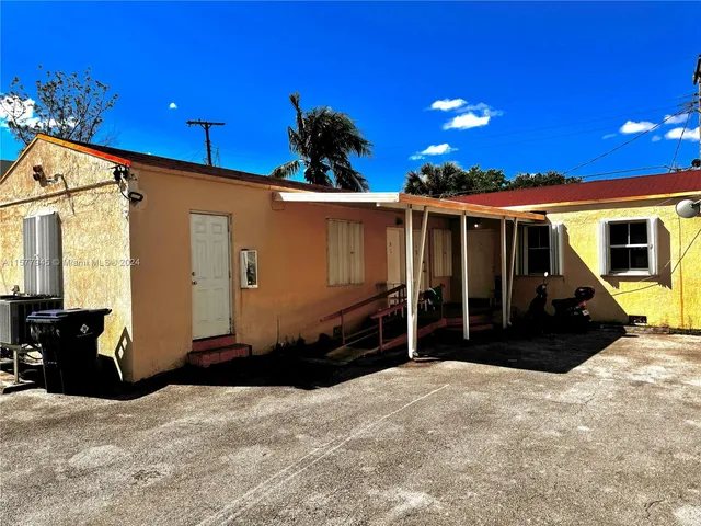 a view of a house with a patio