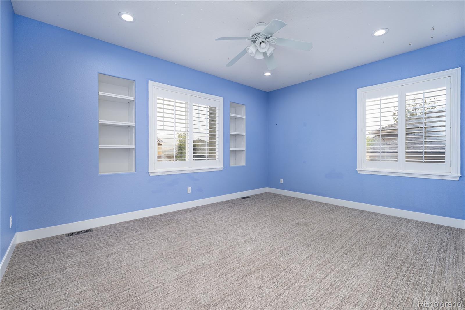 10960 Glengate Circle Highlands Ranch, CO 80130 - Photo 36 of 50 a view of an empty room with a window