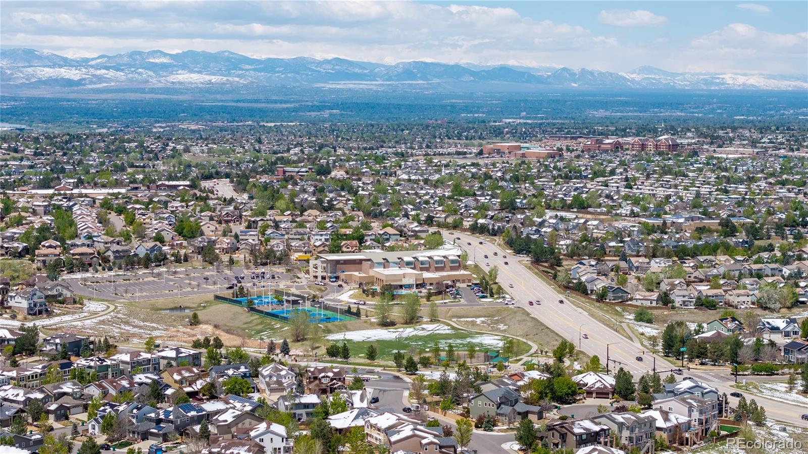 10960 Glengate Circle Highlands Ranch, CO 80130 - Photo 50 of 50 an aerial view of residential houses with city view
