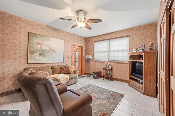 a kitchen with stainless steel appliances granite countertop a stove and cabinets