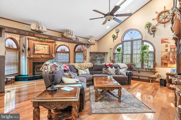 a bedroom with a large bed and a large window