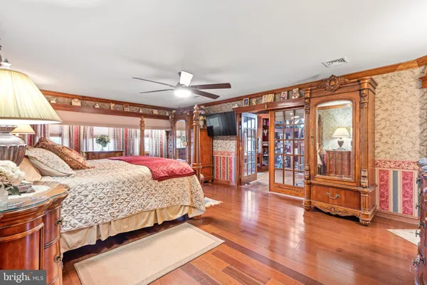 a storage room with wooden floor and window