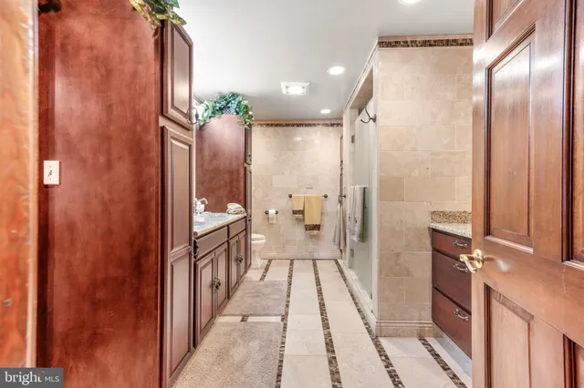 a room with lots of furniture and white walls