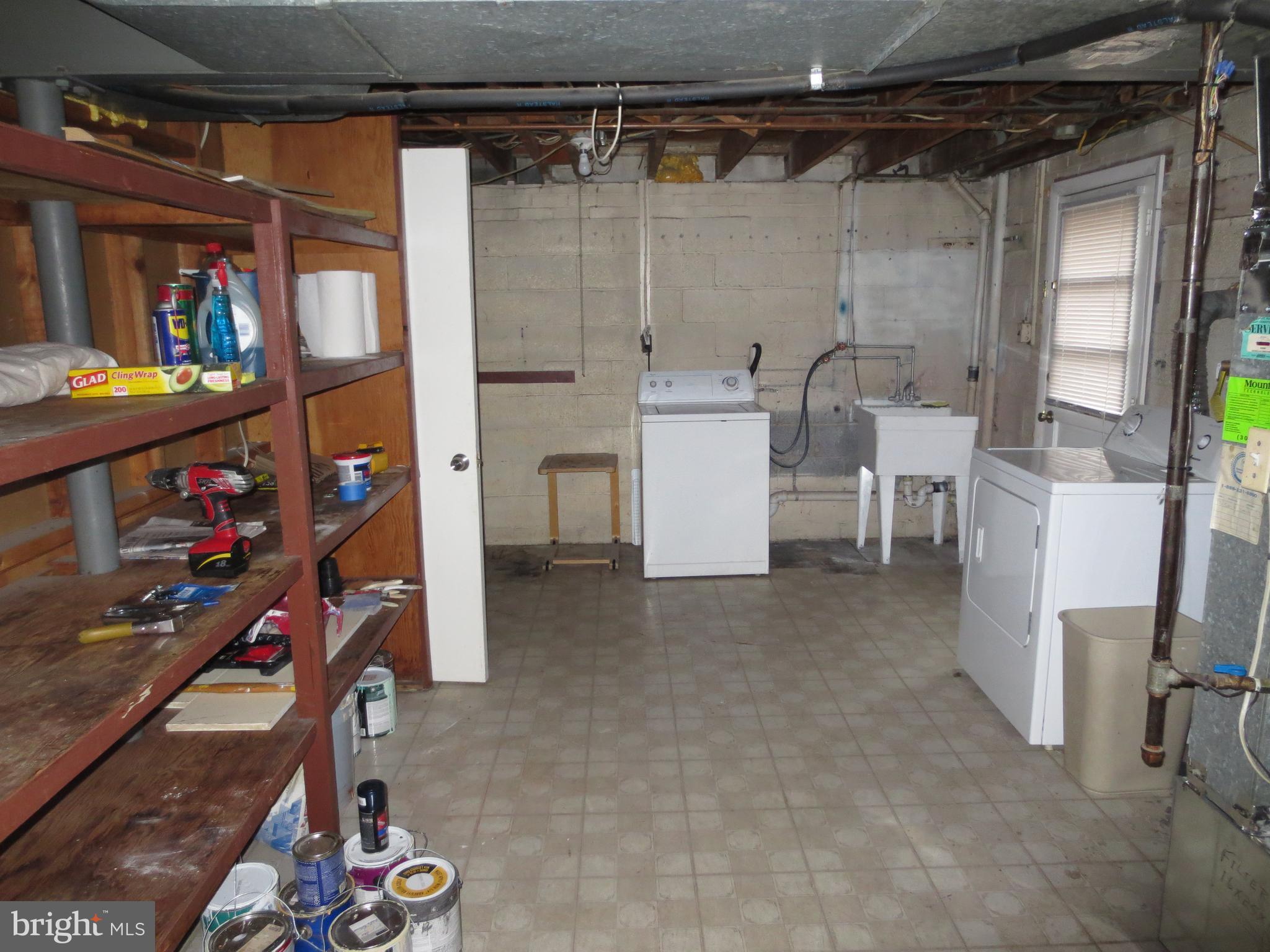 3705 May Street Silver Spring, MD 20906 - Photo 19 of 27 Basement workshop, laundry room & storage