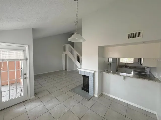 a view of kitchen and workspace