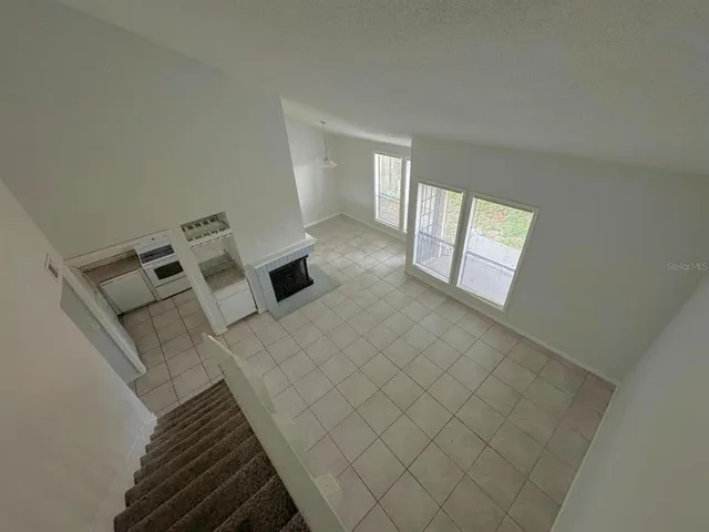 a view of a livingroom with white walls