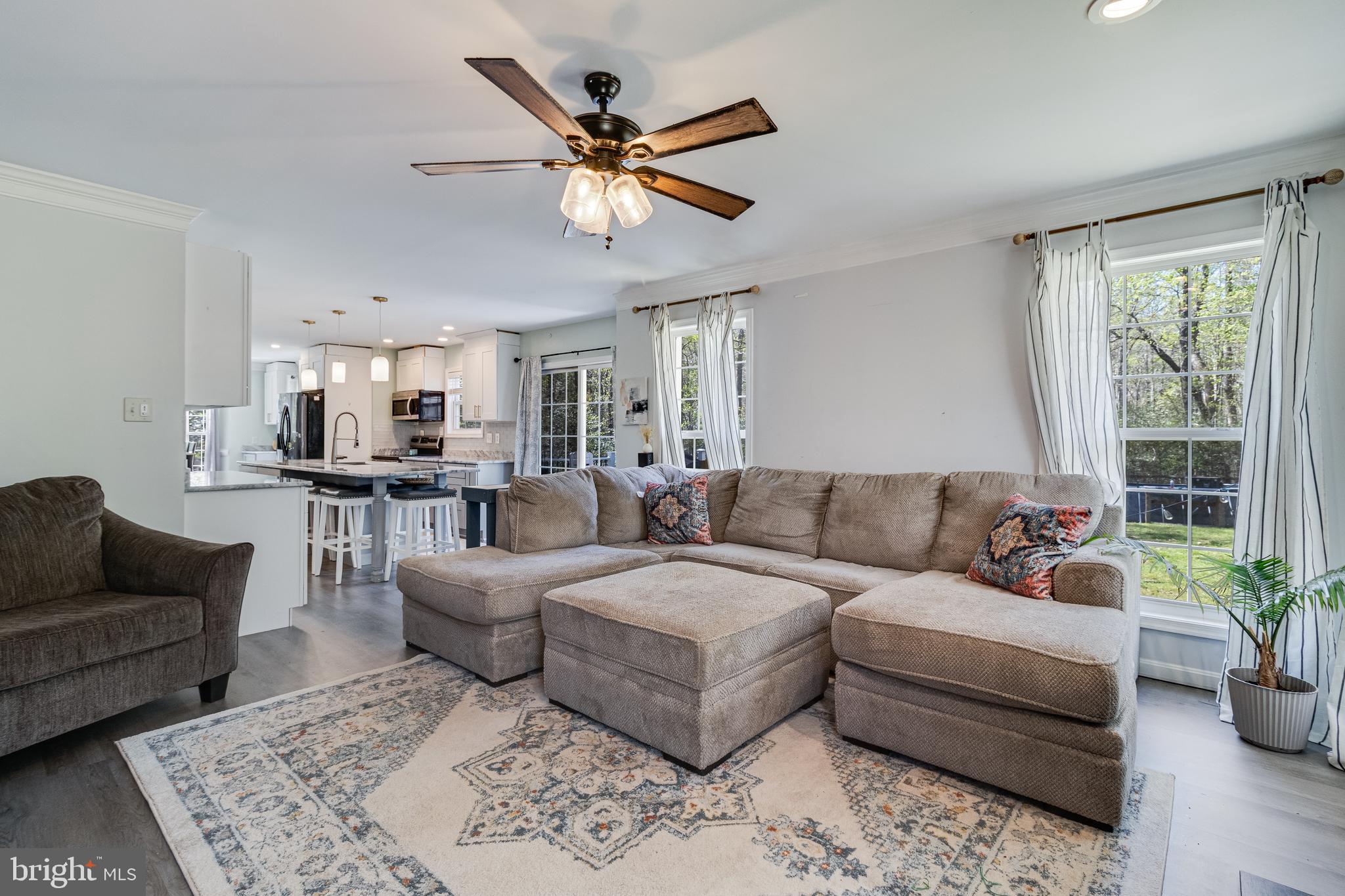 8442 Delegate Drive King George, VA 22485 - Photo 15 of 42 a living room with furniture kitchen view and a window