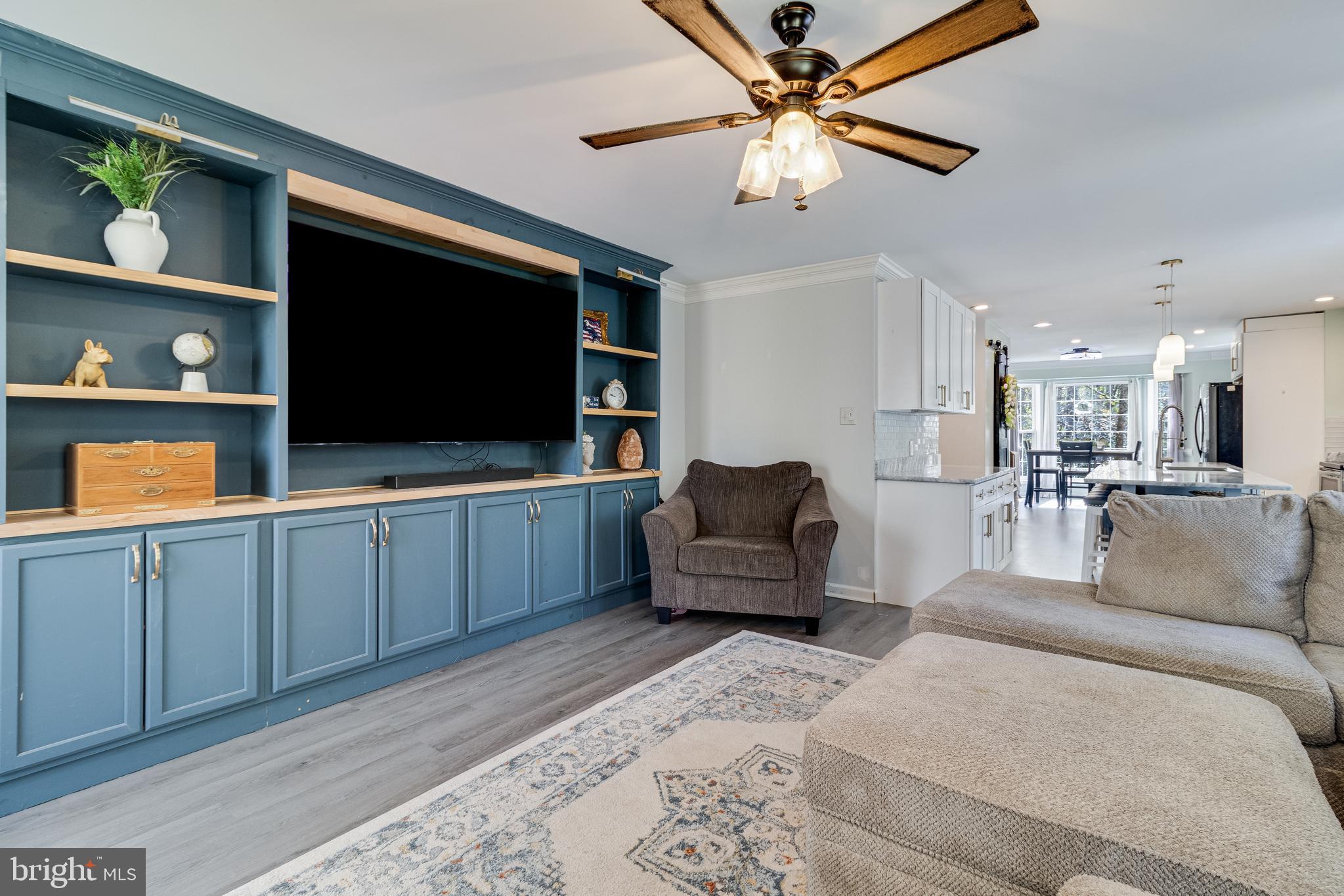 8442 Delegate Drive King George, VA 22485 - Photo 16 of 42 a living room with furniture and a flat screen tv