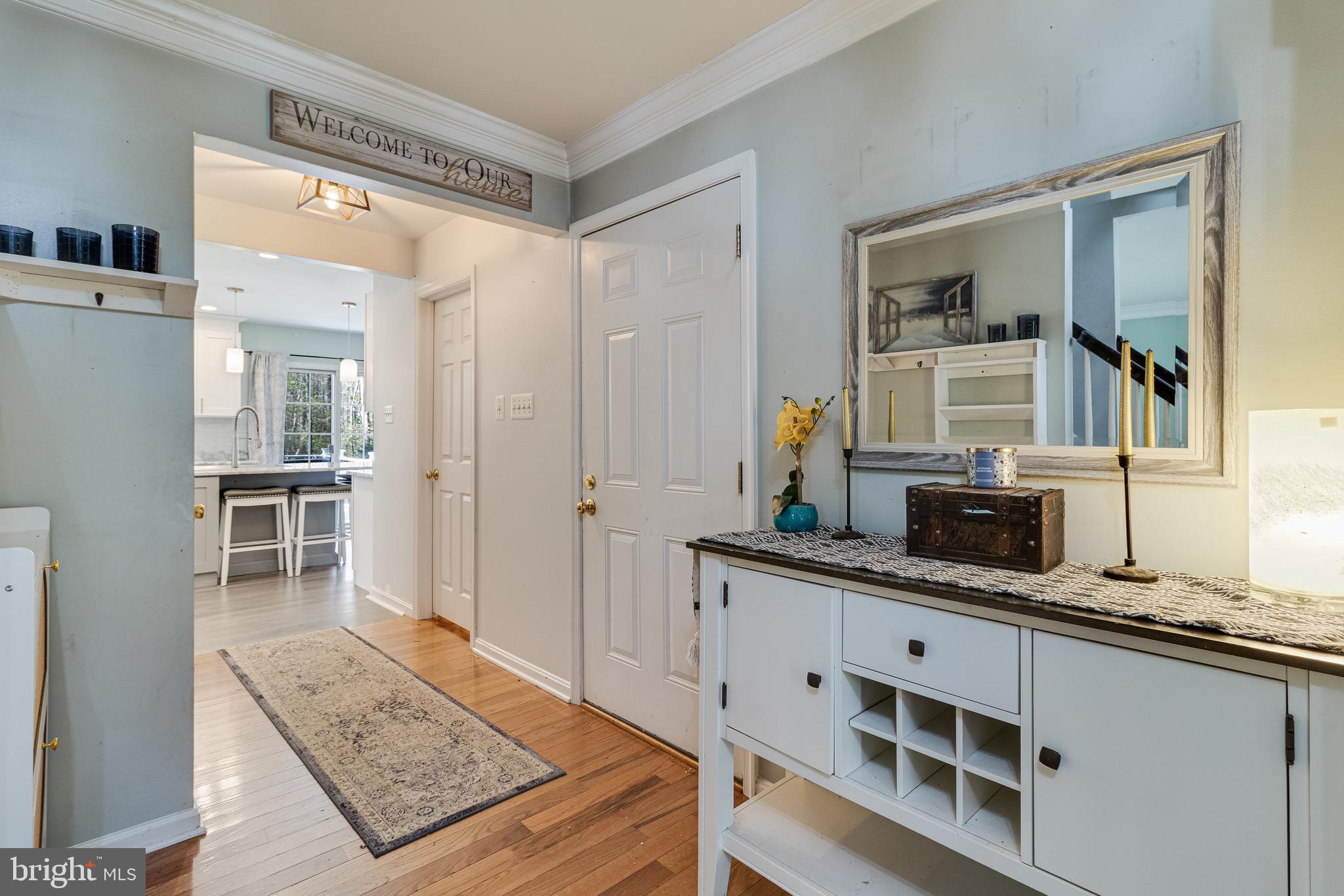 8442 Delegate Drive King George, VA 22485 - Photo 21 of 42 a spacious bathroom with a granite countertop sink and a mirror