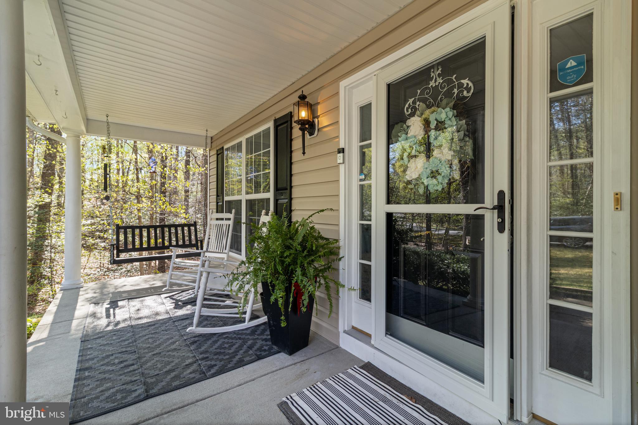 8442 Delegate Drive King George, VA 22485 - Photo 3 of 42 a porch with seating space