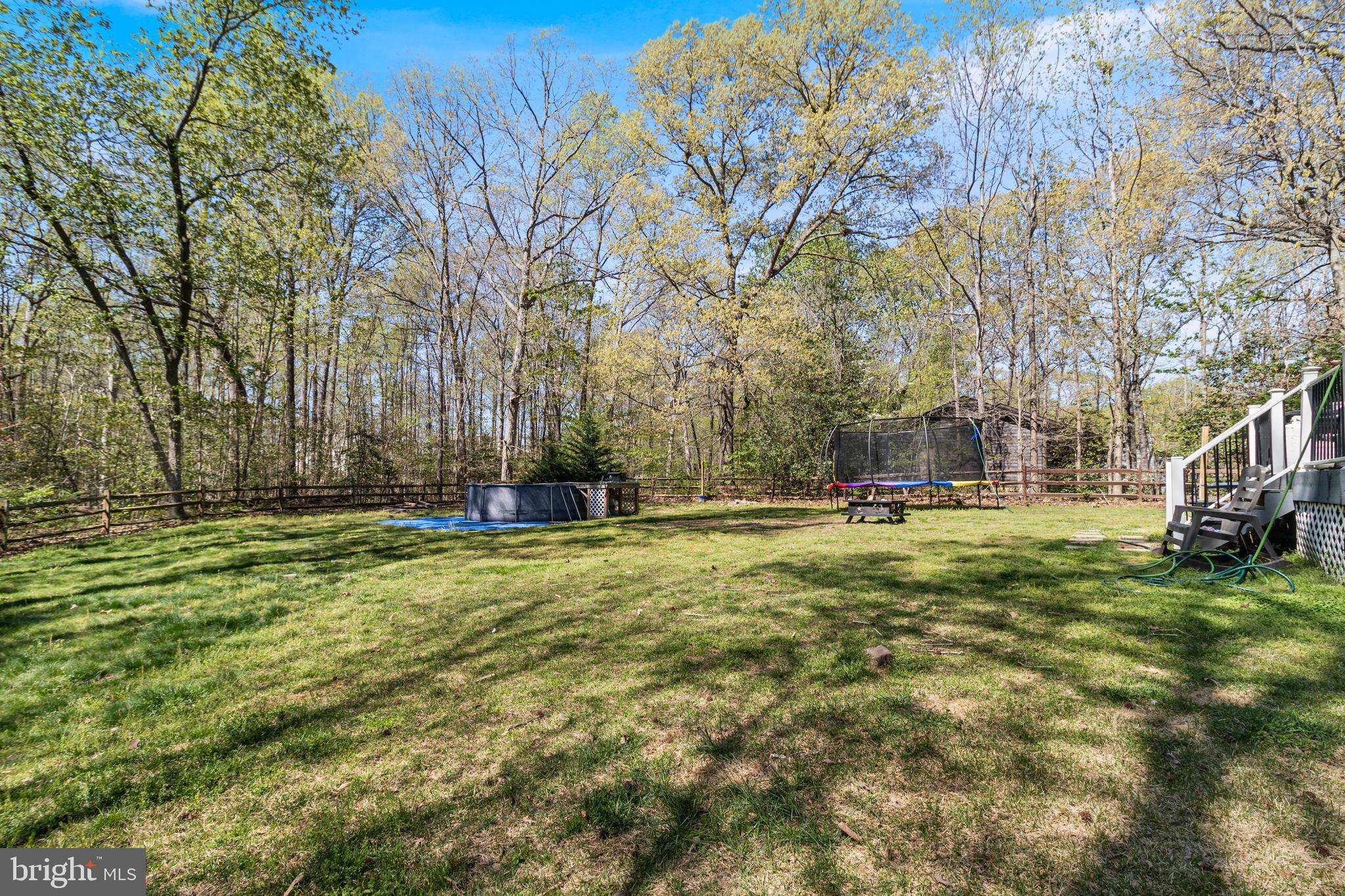 8442 Delegate Drive King George, VA 22485 - Photo 38 of 42 a view of yard with swimming pool