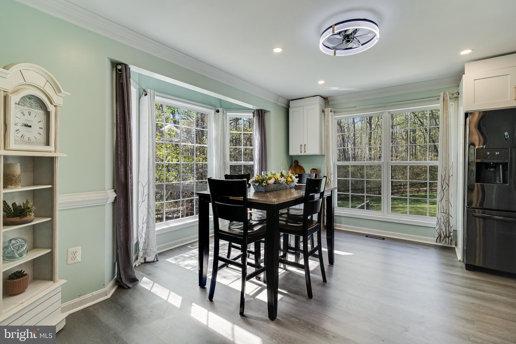 8442 Delegate Drive King George, VA 22485 - Photo 4 of 42 a view of a dining room with furniture window and outside view