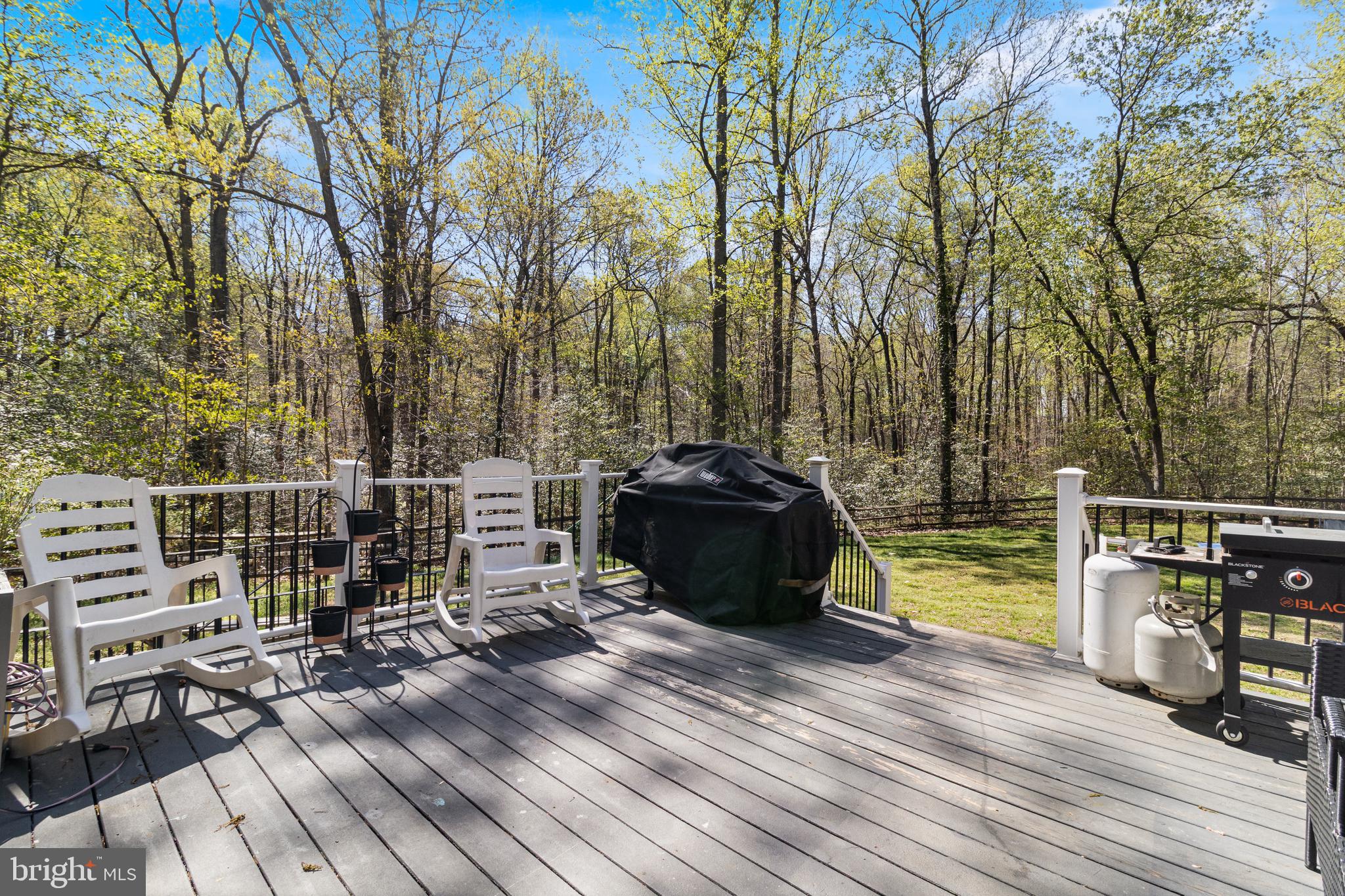 8442 Delegate Drive King George, VA 22485 - Photo 41 of 42 a view of a balcony with wooden floor and outdoor seating