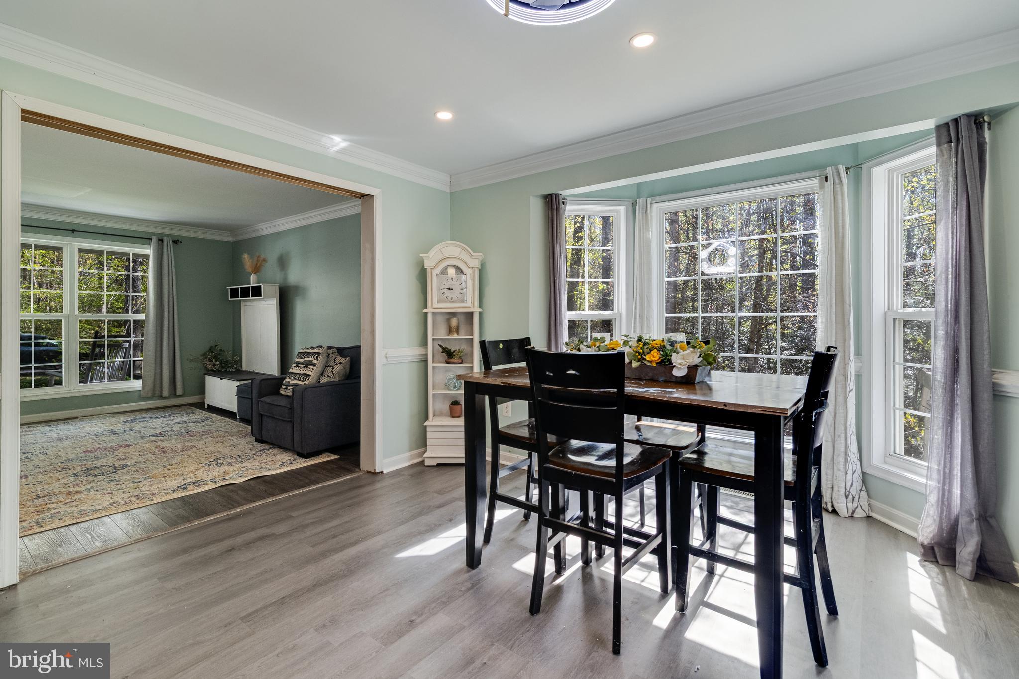 8442 Delegate Drive King George, VA 22485 - Photo 6 of 42 a view of a dining room with furniture and wooden floor