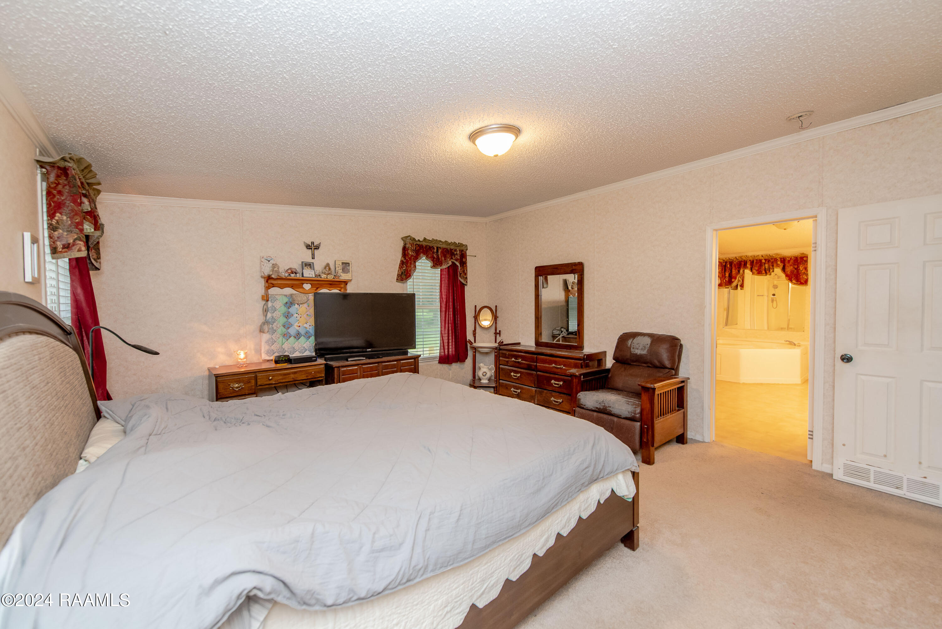 1715 Savoy Road Youngsville, LA 70592 - Photo 18 of 37 Master Bedroom