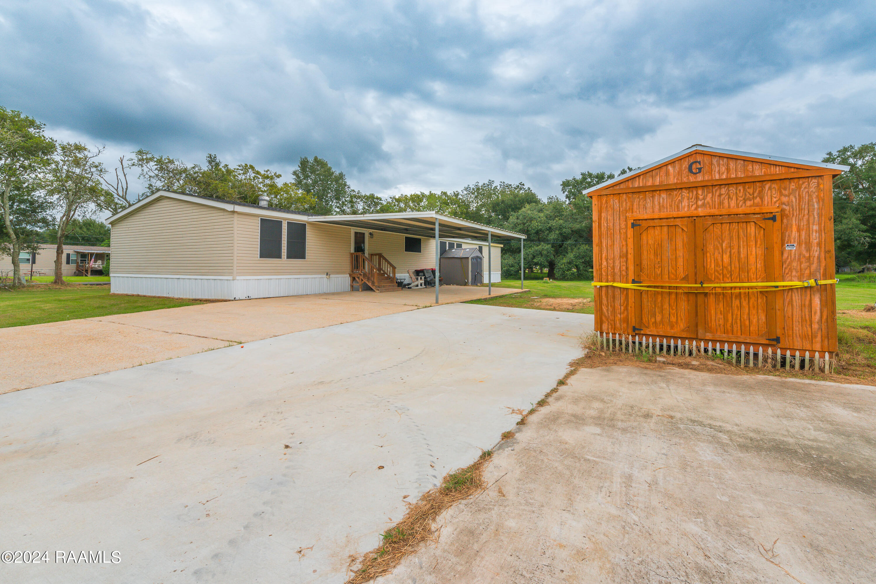 1715 Savoy Road Youngsville, LA 70592 - Photo 32 of 37 Backyard